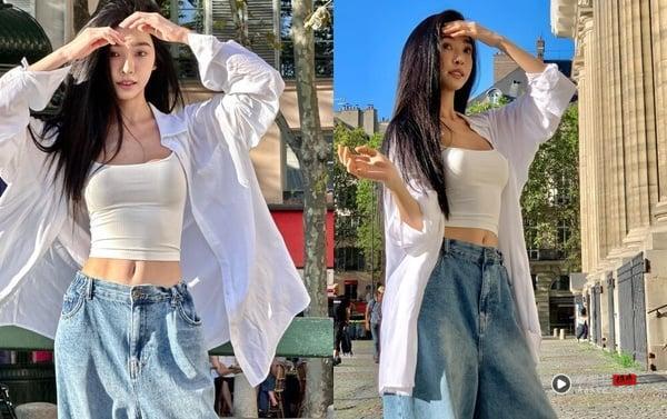 衬衫穿搭攻略!从白衬衫到牛仔衬衫,20大实用搭法+80种穿搭时髦范本,轻松驾驭! 内容图5 新潮社-实时最新热点娱乐时尚美妆等新闻资讯网站! 易梦玲示范层次穿搭,将宽松白衬衫当作外套,内搭白色背心与牛仔裤,视觉上更显瘦。