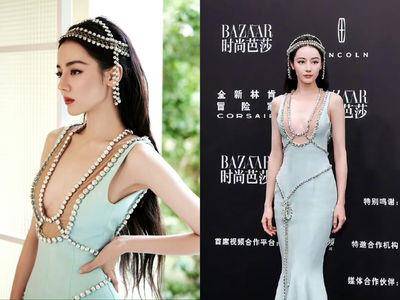 迪丽热巴“美人鱼上岸”造型封神！　穿深U钻饰鱼尾裙气势全开