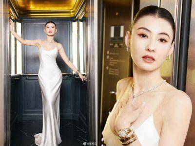 43岁张柏芝性感双沟太诱人！457万美蛇爬上身，简直美得不像人