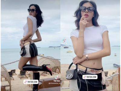 Lisa迷你裙勉强遮臀　踩“红底长靴”辣翻