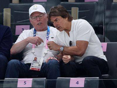 汤姆克鲁斯替体操天后加油　戴劳力士配质感休闲装帅翻