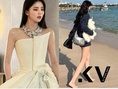 韩韶禧女神造型降临坎城 空挡脱华服抱玩偶冲海边