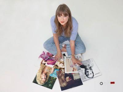 泰勒丝购回版权金光闪闪 LV与Tiffany钻戒见证开心时刻